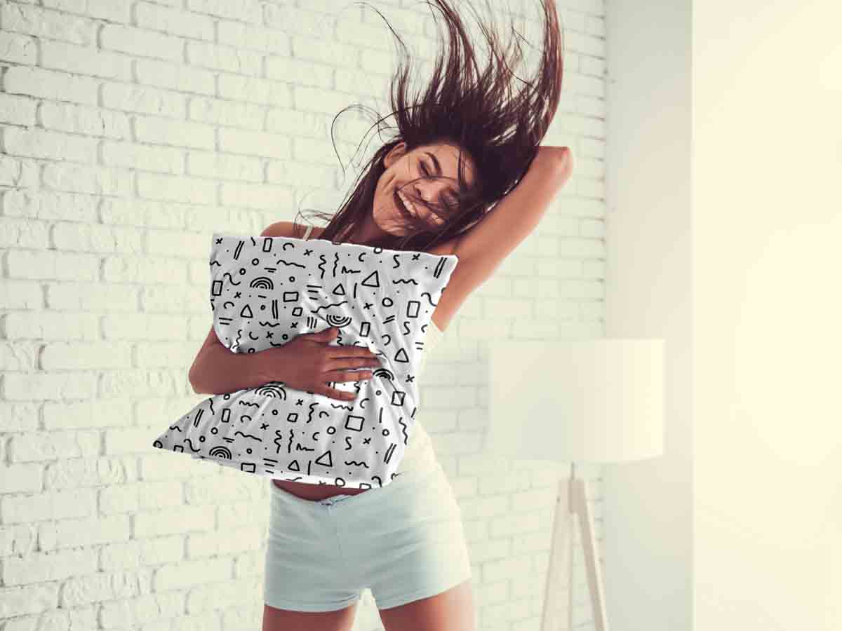 Coussin de santé blanc avec formes en noir