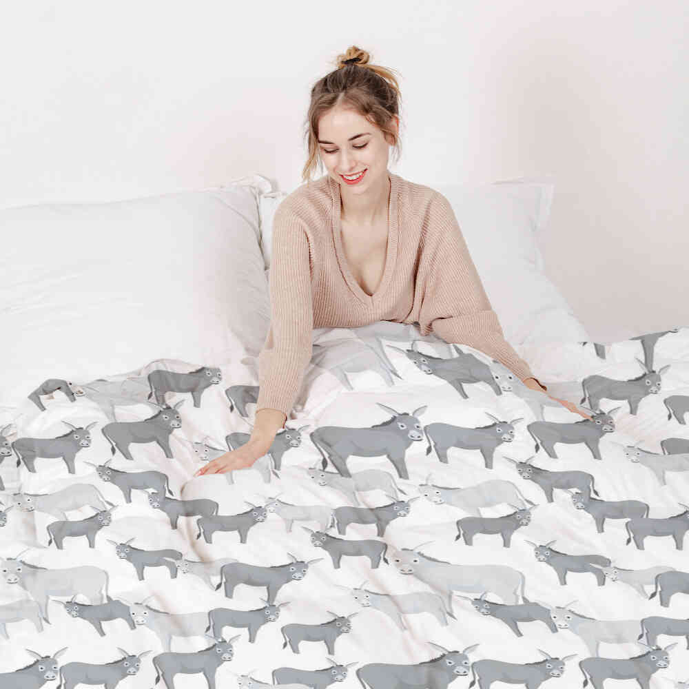 Ensemble de literie avec couvertures thérapeutiques gris avec des ânes