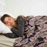 Therapy blanket and bedding set, black with purple leaves.