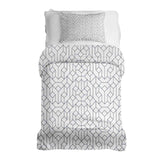 Therapy blanket bedding set with black pattern.