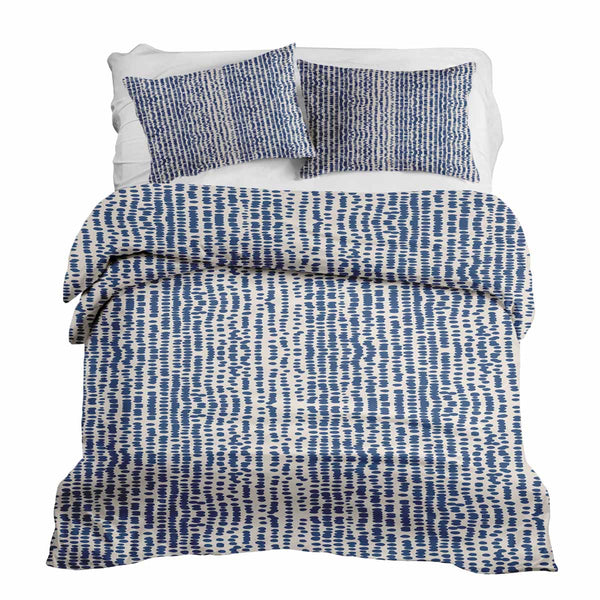 Therapy blanket and bedding set with blue dots.