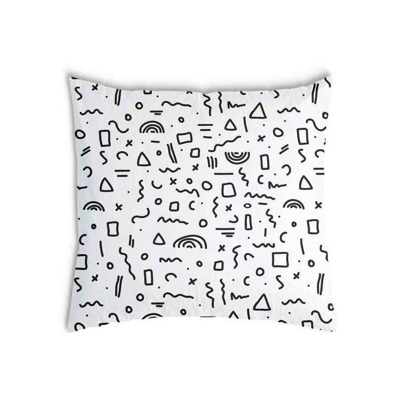 White health pillow with black shapes.