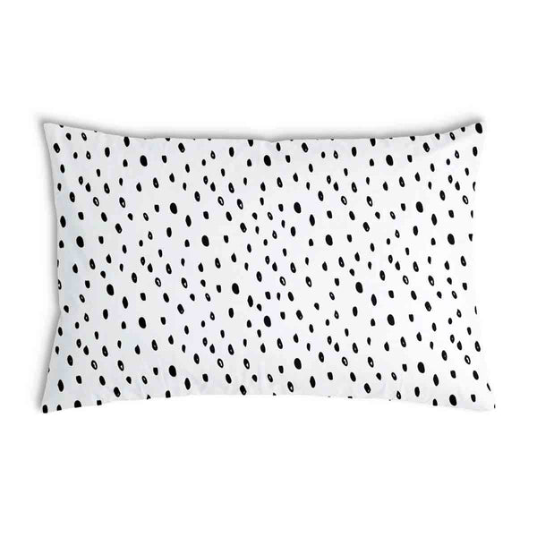 White health pillow with many small dots.