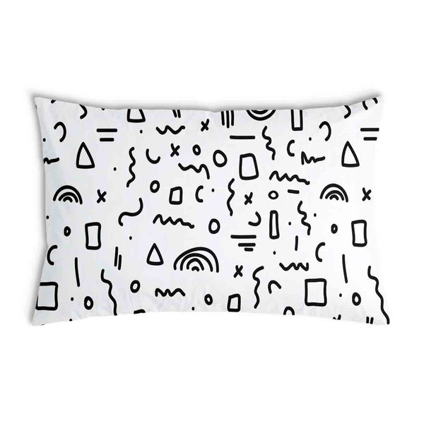 White health pillow with black shapes.