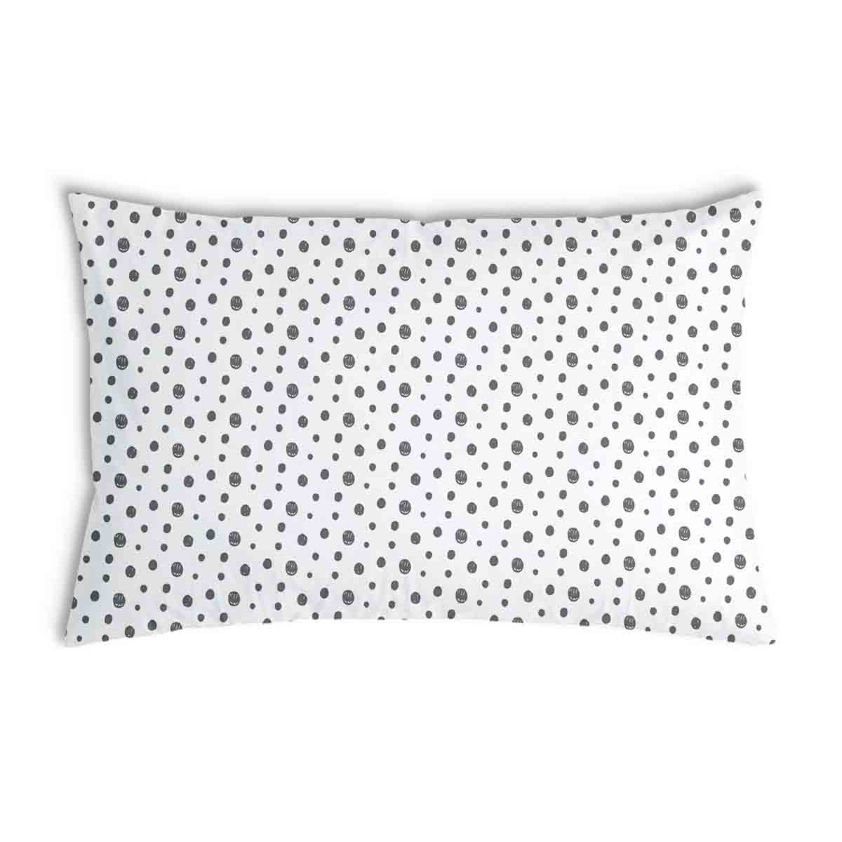 Coussin de santé blanc avec de nombreux points gris