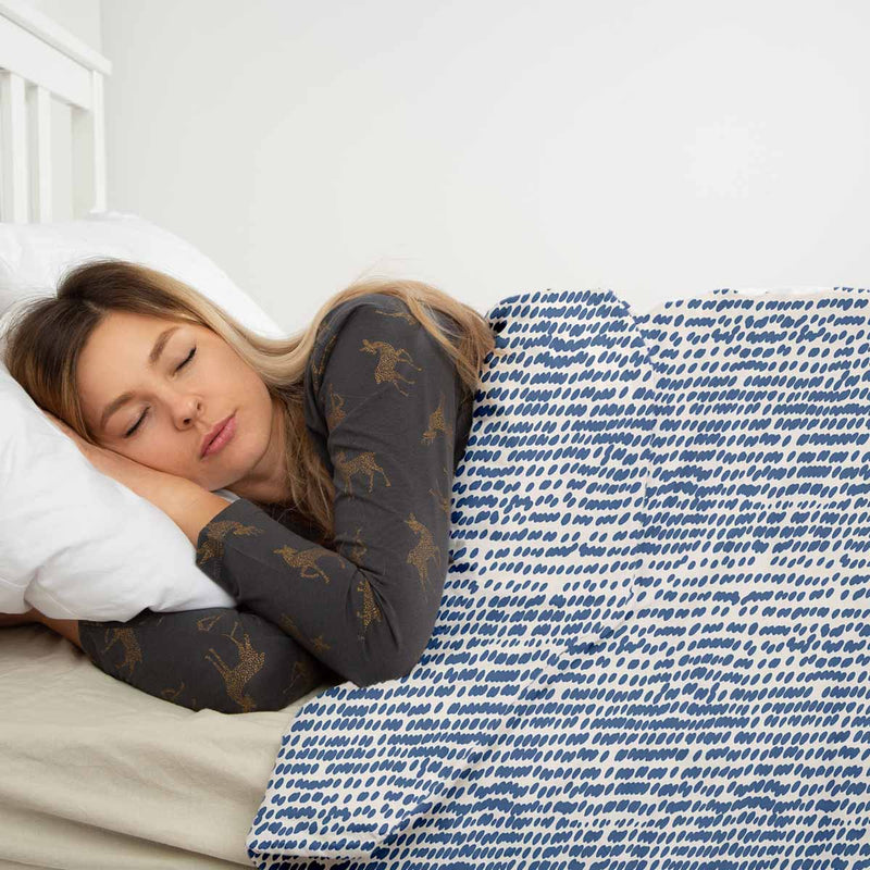 Therapy blanket and bedding set with blue dots.