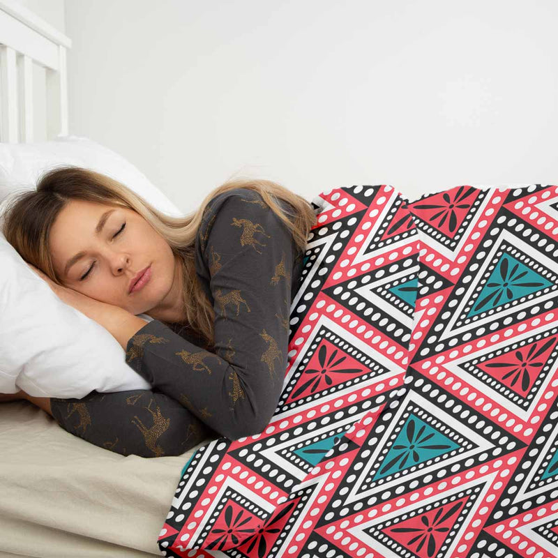 Therapy blanket and bedding set with colorful triangles