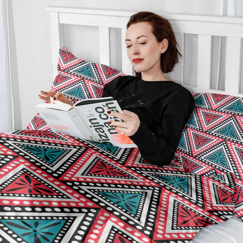 Therapy blanket and bedding set with colorful triangles