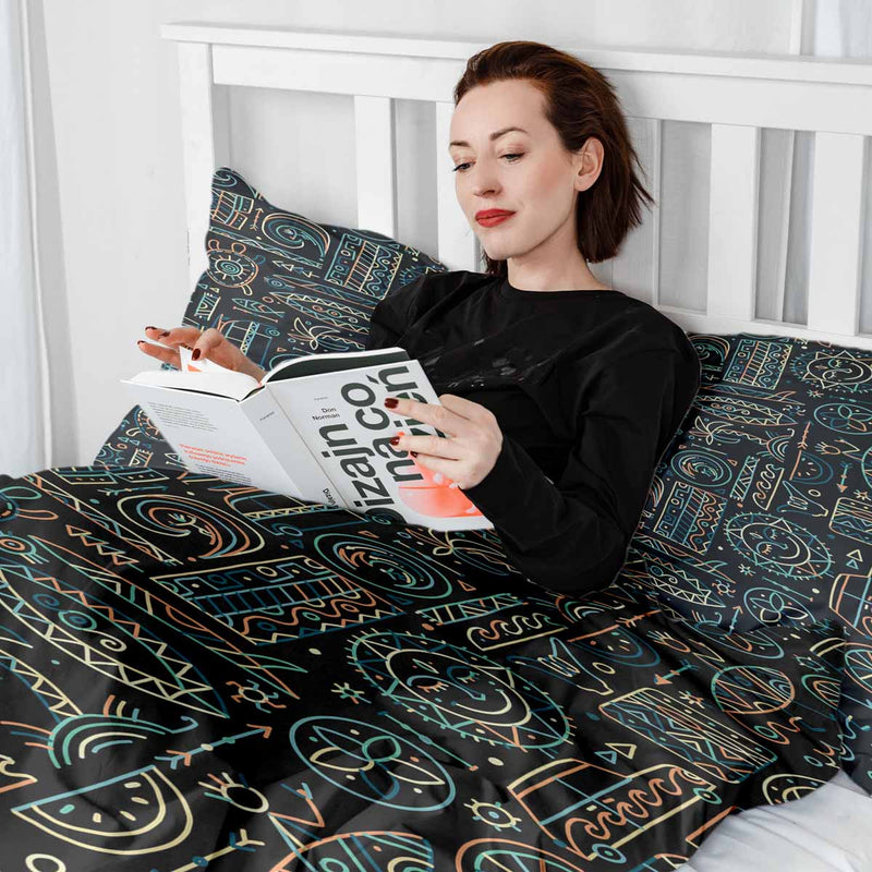 Therapy blanket and bedding set with green Hawaiian pattern.