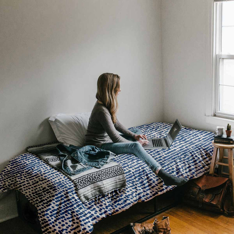 Therapy blanket and bedding set with blue dots.