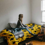 Therapy blanket and bedding set, yellow with dinosaurs.