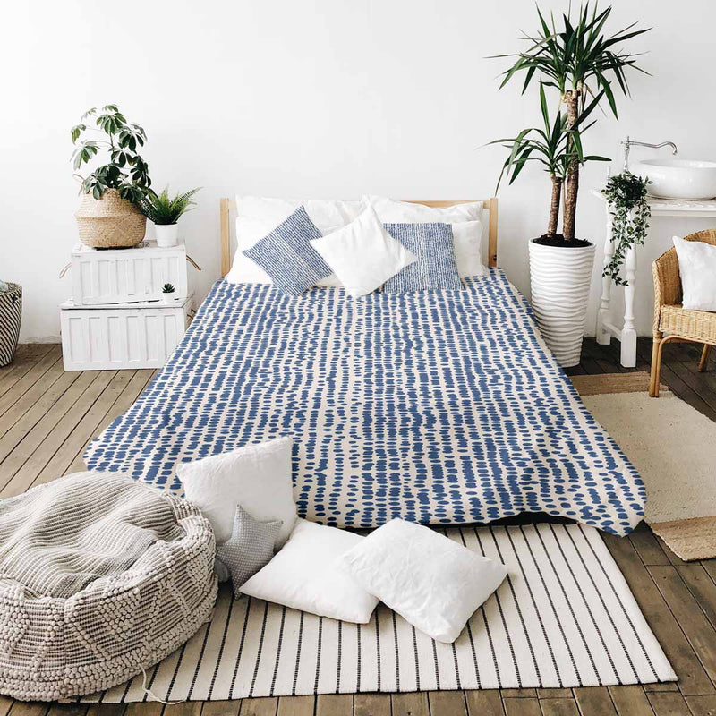 Therapy blanket and bedding set with blue dots.