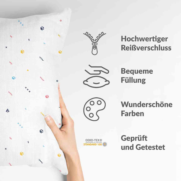 White health pillow with colorful shapes