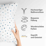 White health pillow with small blue shapes