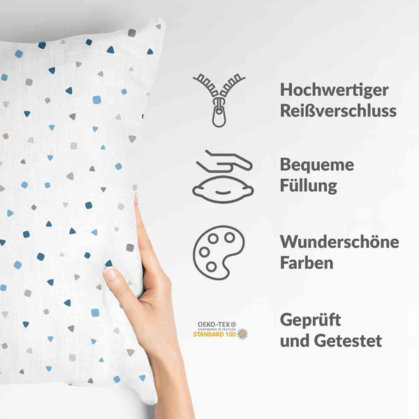 White health pillow with small blue shapes