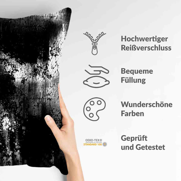 Health pillow, black with a mottled pattern.