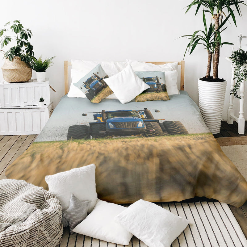 Therapy blanket and bedding set, tractor design in blue.