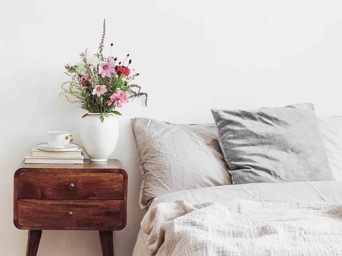 Health pillow with gray palm leaves