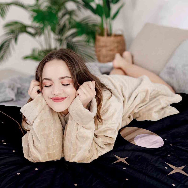Therapy blanket and bedding set, black with sun, moon and stars.
