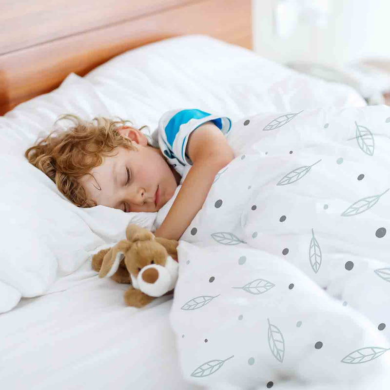 Therapy blanket bedding set, white with feathers and dots.