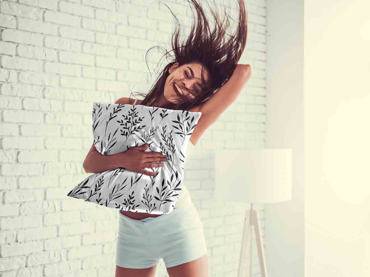 Coussin de santé blanc avec des branches noires