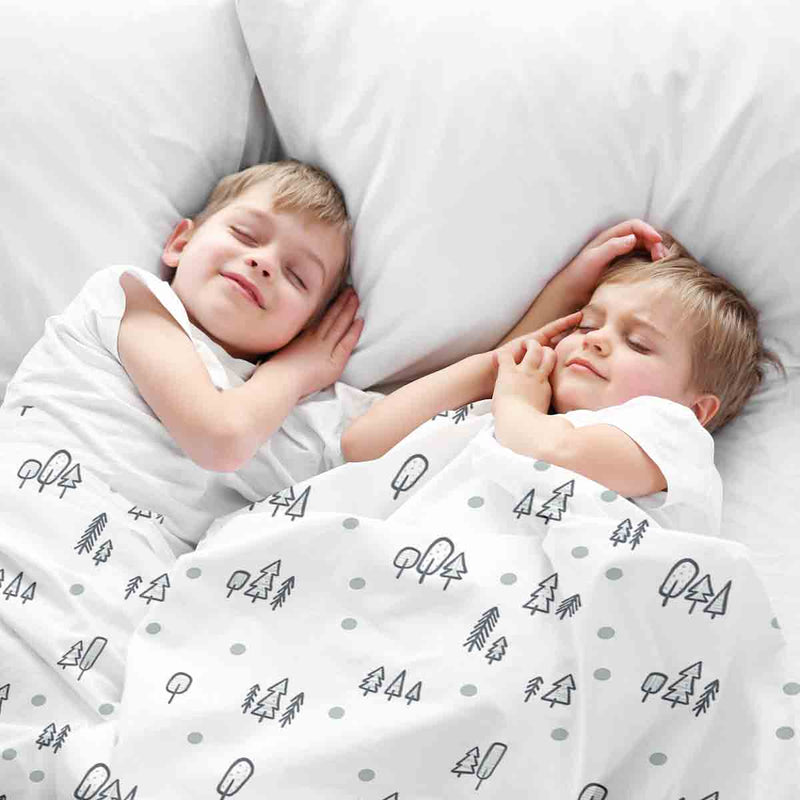 Therapy blanket and bedding set, white with dots and trees.