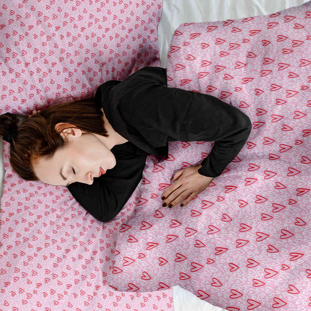 Ensemble de literie avec couverture thérapeutique rose à cœurs rouges