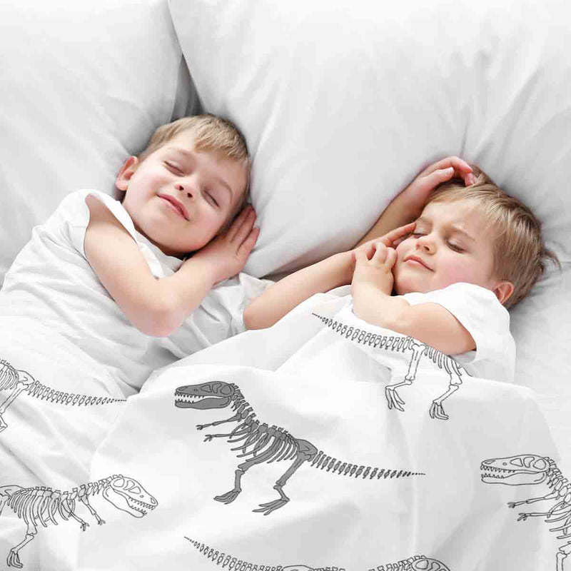 Therapy blanket bedding set, white with dinosaur skeleton.