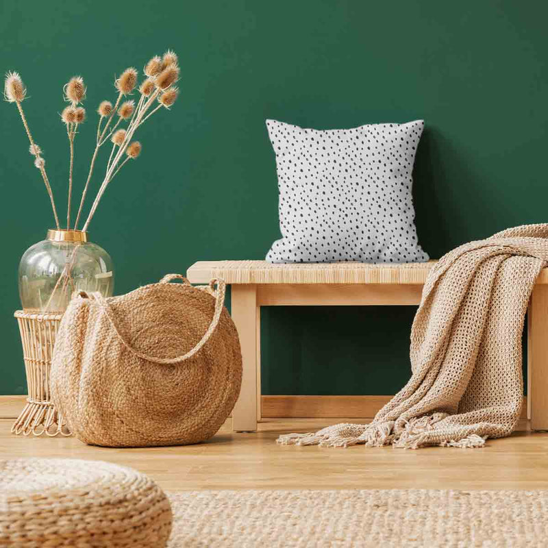 White health pillow with many small dots.