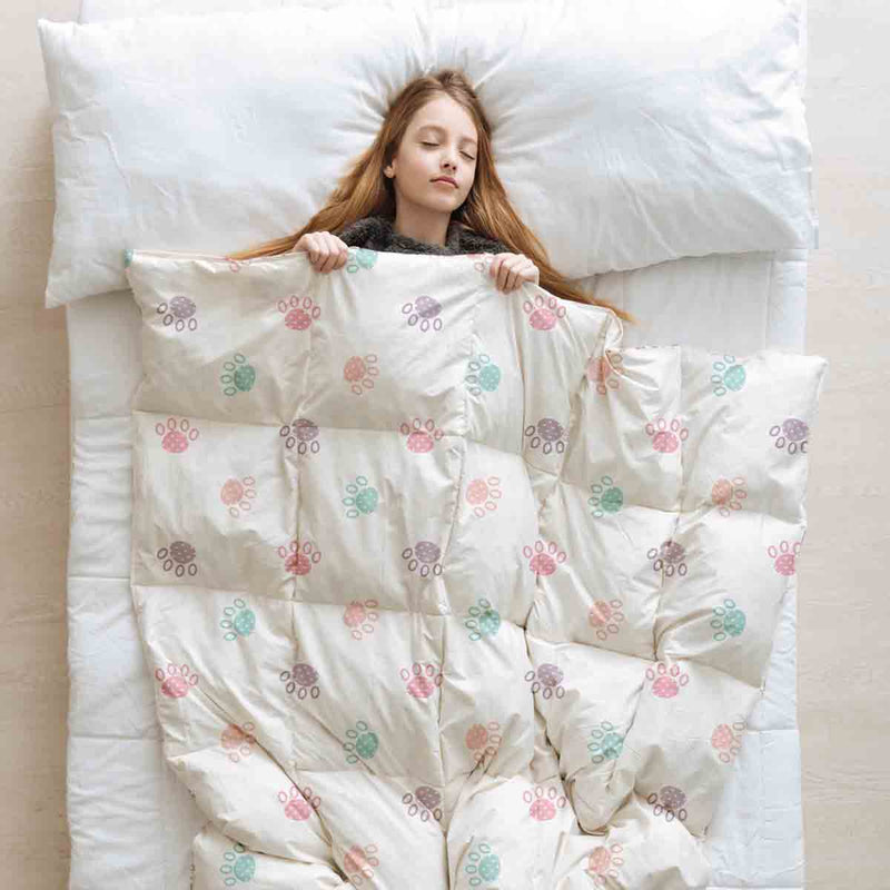 Therapy blanket and bedding set, white with colorful paws.
