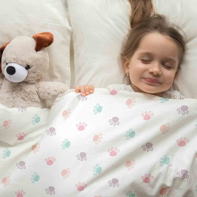 Therapy blanket and bedding set, white with colorful paws.