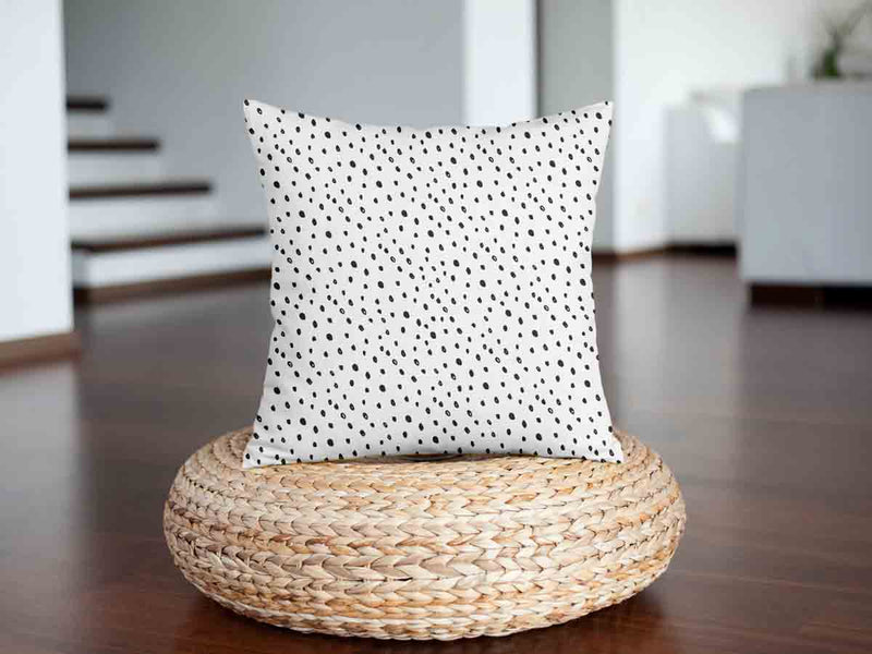 White health pillow with many small dots.