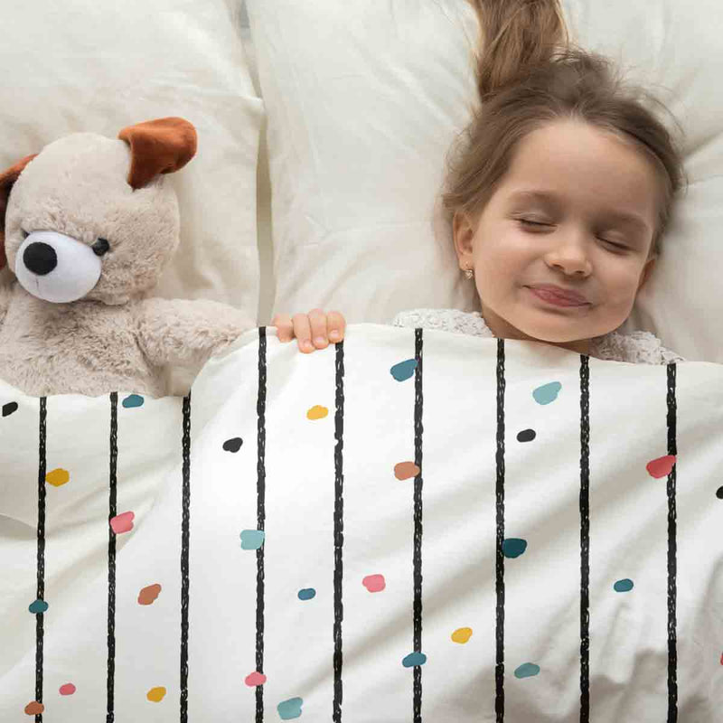Therapy blanket and bedding set with colorful dots.