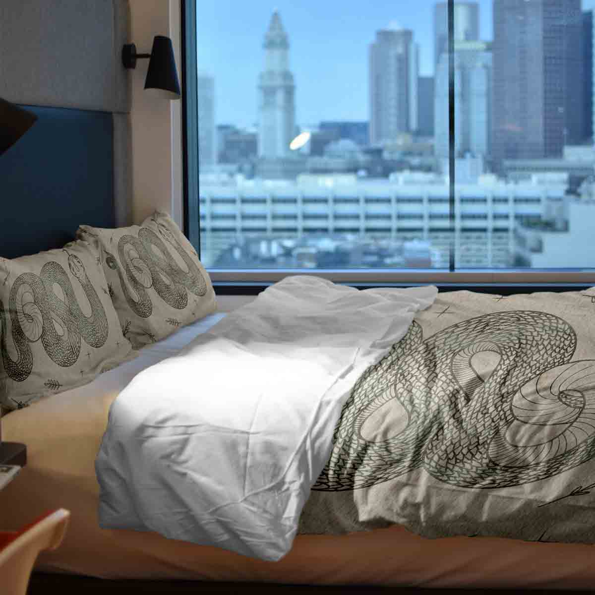 Ensemble de literie beige avec couverture thérapeutique et serpent