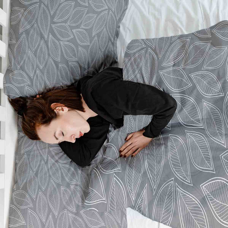 Therapy blankets and bedding set, grey with white palm leaves.