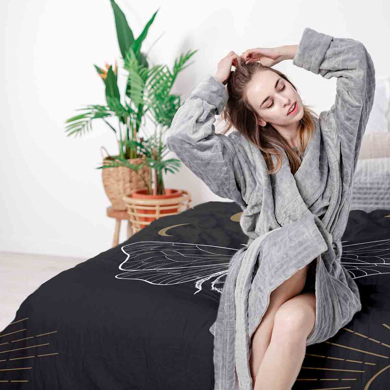 Therapy blanket bedding set, black with moth design.