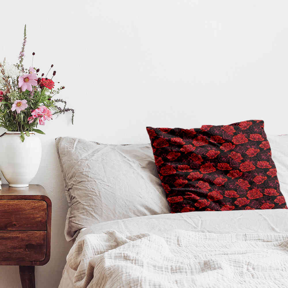 Coussin de santé noir avec des roses rouges