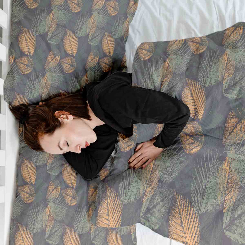 Therapy blanket and bedding set with autumnal leaf pattern.
