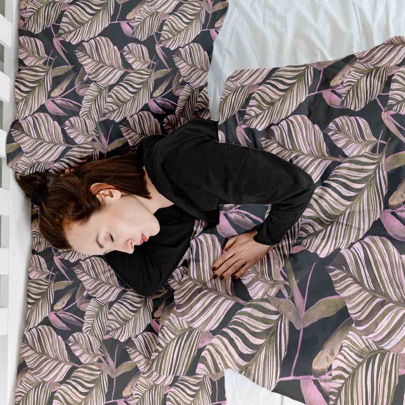 Therapy blanket and bedding set, black with purple leaves.