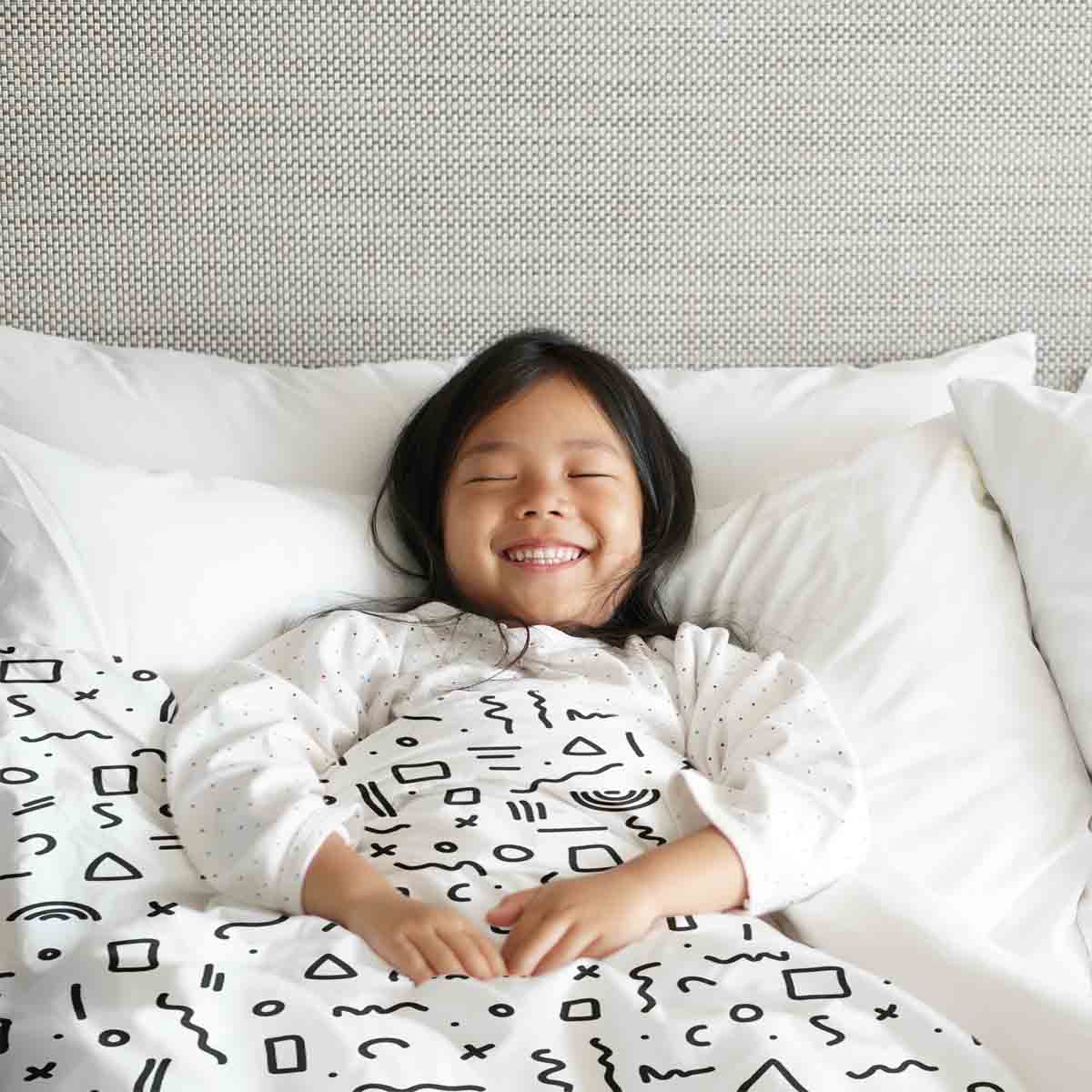 Couette thérapeutique ensemble de literie blanc avec formes en noir