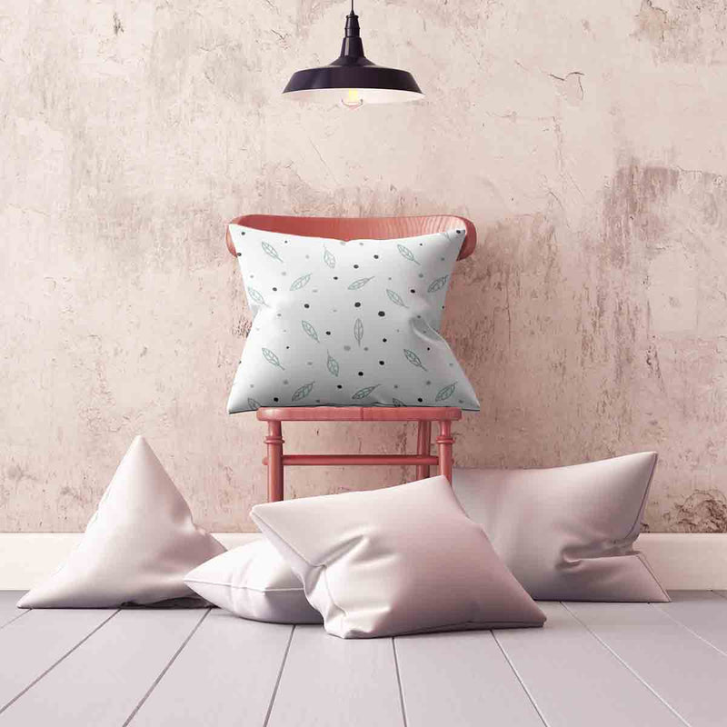 White health pillow with feathers and dots