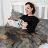 Therapy blanket and bedding set with autumnal leaf pattern.