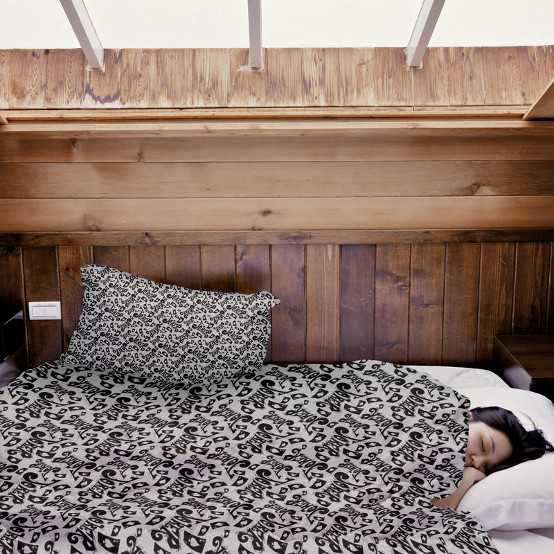 Therapy blanket bedding set with the inscription "Joker" in black.