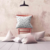 Health pillow, white with dots and trees.