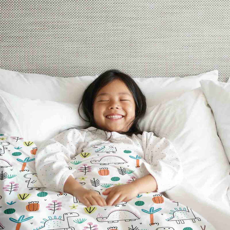 Therapy blanket and bedding set with colorful dinosaurs