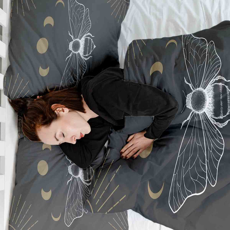 Therapy blanket bedding set, black with moth design.