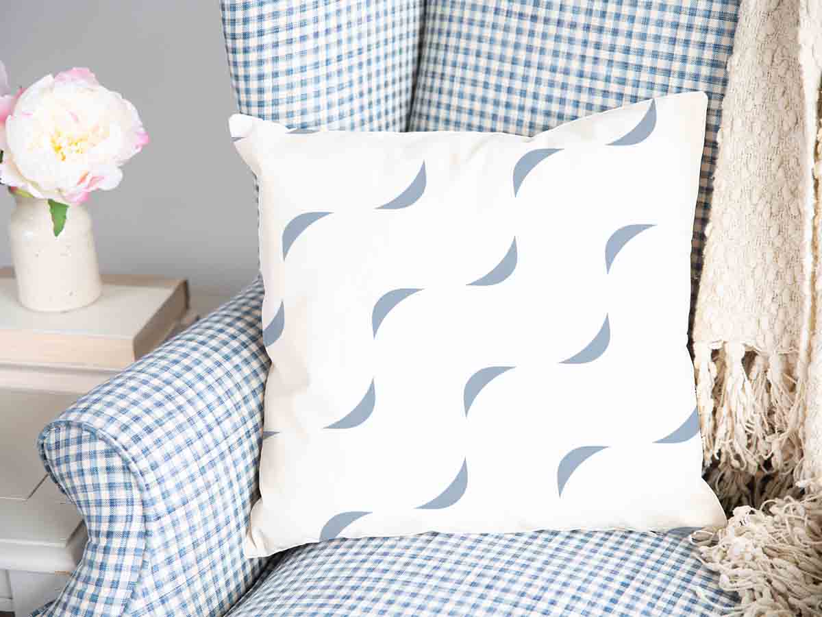 Coussin de santé blanc avec des vagues bleues