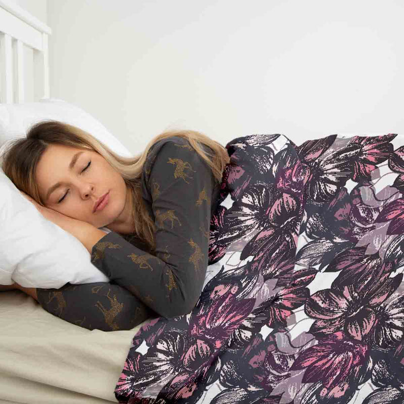 Therapy blanket and bedding set with a sea of purple flowers.