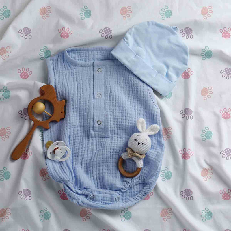 Therapy blanket and bedding set, white with colorful paws.