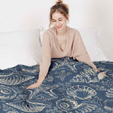 Therapy blanket and bedding set, blue with shells.